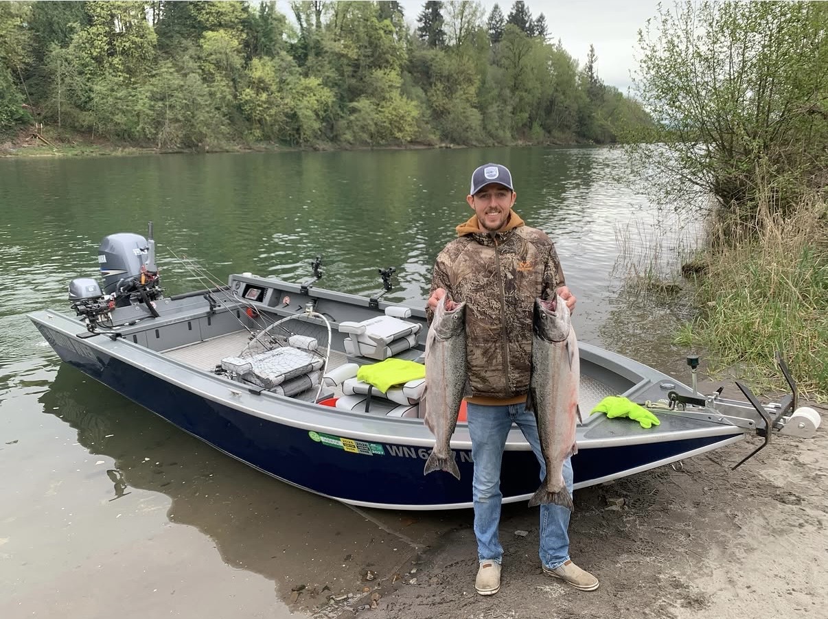 Captain Sean's jet sled pulled up on a forested riverbank